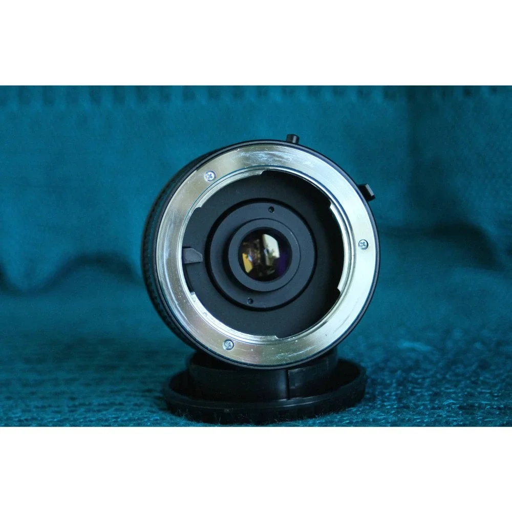 Vivitar 75-205 MM F1:3.8 Lens for Minolta MC mount with 2x converter.